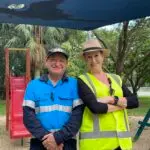 Playground Safety Auditors smiling crossed arms team work During Inspection Audit