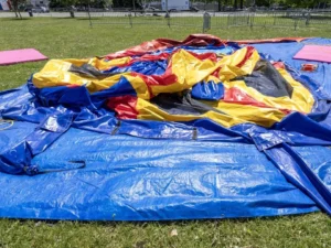 Strong winds lifted the inflatable castle into the air during a community celebration at a Montreal park. 