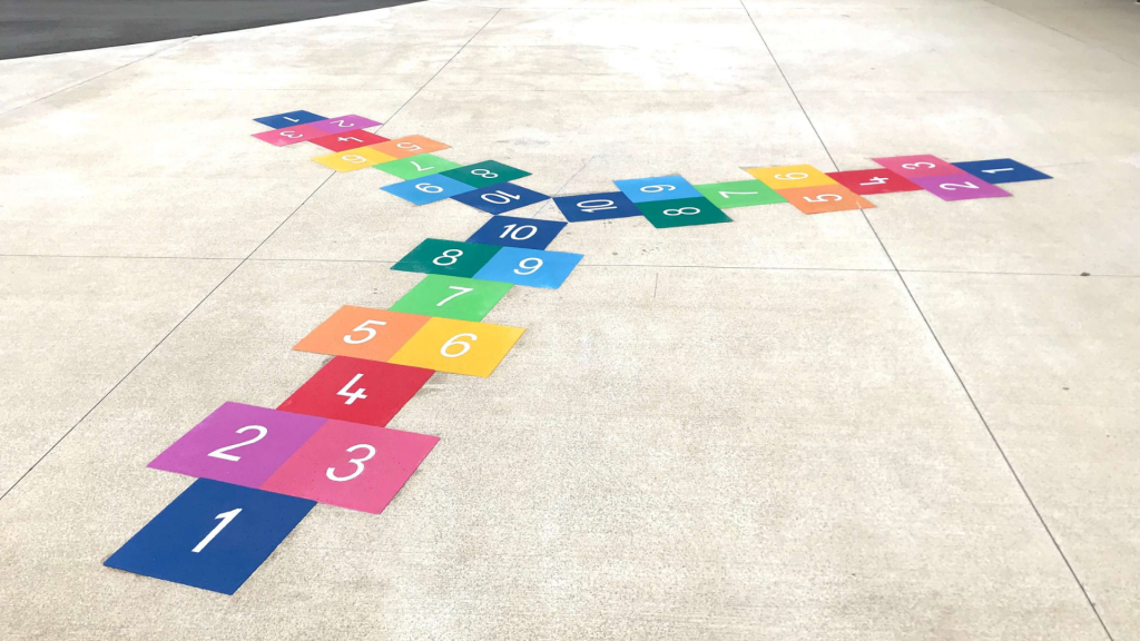 Numbered hopscotch game on pavement